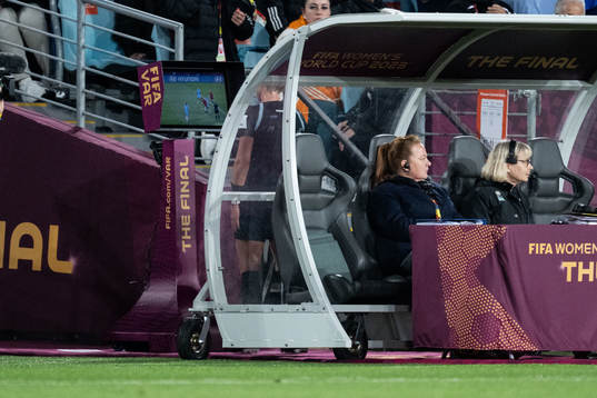 Referee Tori Penso checks the VAR screen for possible