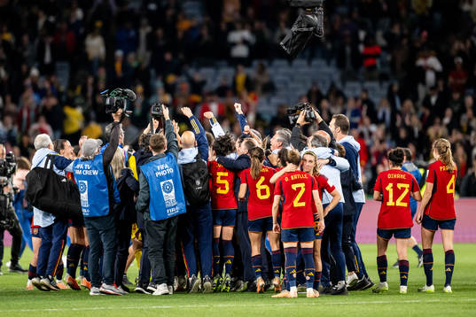 Players of Spain celebrate