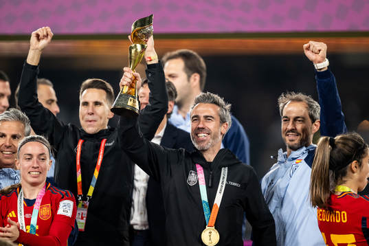 Head coach Jorge Vilda of Spain celebrates with the trophy