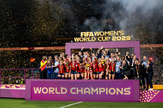 Players of Spain celebrate with the trophy