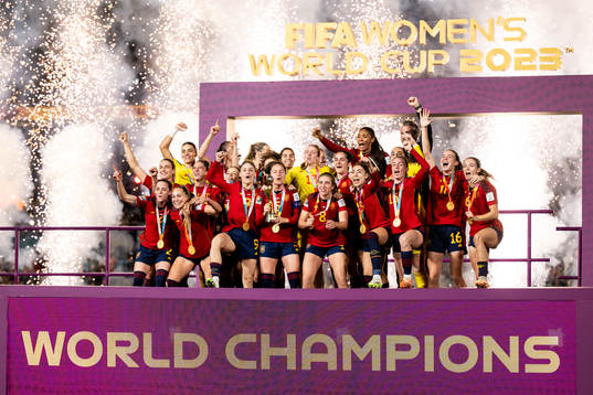 Players of Spain celebrate with the trophy