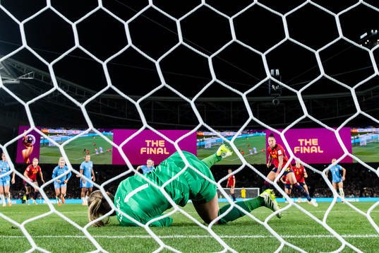 Goalkeeper Mary Earps of England saves a penalty from