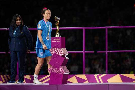 Lucy Bronze of England looks dejected as she walks by the