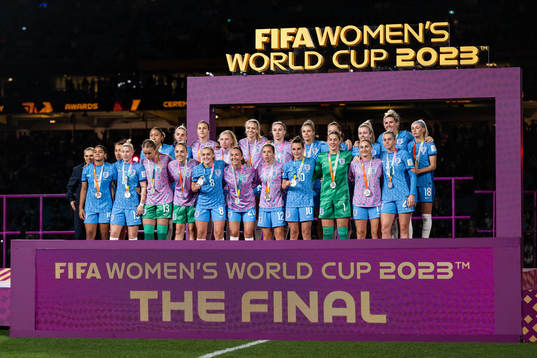 Players of England pose for a photo at the medal ceremony