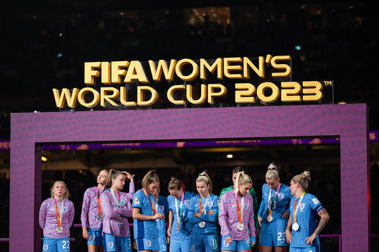 Players of England looks dejected at the medal ceremony