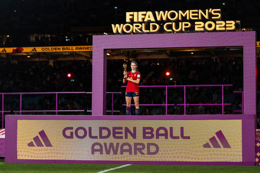 Aitana Bonmati of Spain poses with the Golden Ball Award at