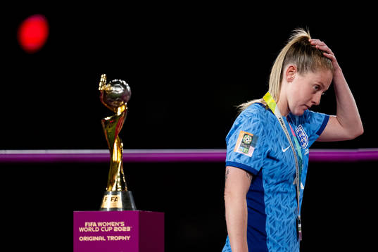 Keira Walsh of England looks dejected as she walks past by