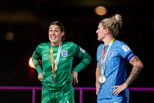 Goalkeeper Mary Earps and Millie Bright of England look