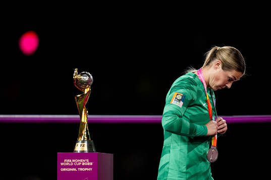 Goalkeeper Mary Earps of England looks dejected as she