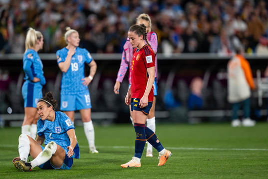 Lucy Bronze of England looks dejected next to Ona Batlle of