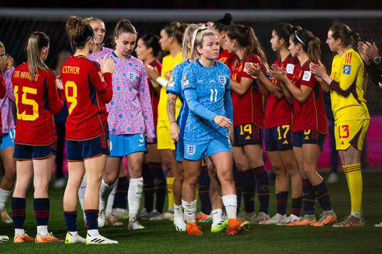 Lauren Hemp of England looks dejected as she walks past