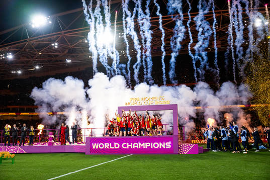 Players of Spain celebrate with the trophy at the medal