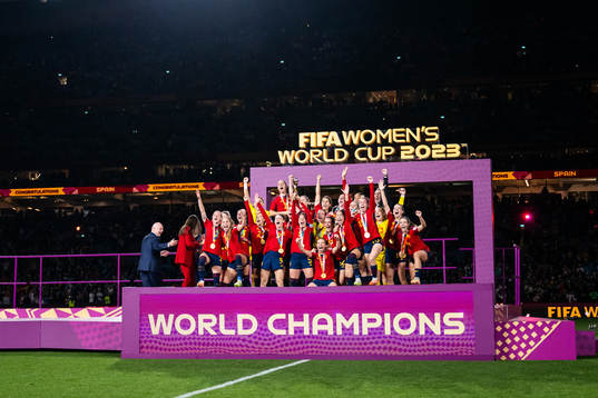 Players of Spain celebrate with the trophy at the medal