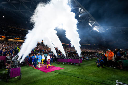 Millie Bright of England and Olga Carmona of Spain enter