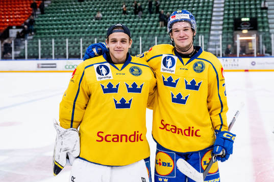 Goaltender Melker Thelin and Elliot Ståhlberg of Sweden