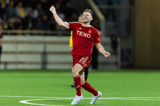 Nicky Devlin of Aberdeen celebrates scoring 2-2