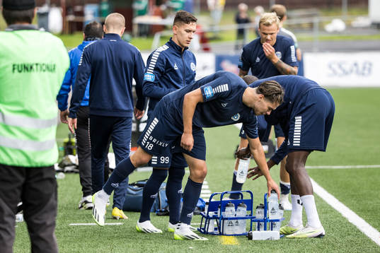 Utsiktens spelare värmer upp innan fotbollsmatchen i