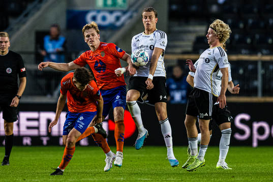 Håkon Hammer of Aalesund and Ole Sæter of Rosenborg