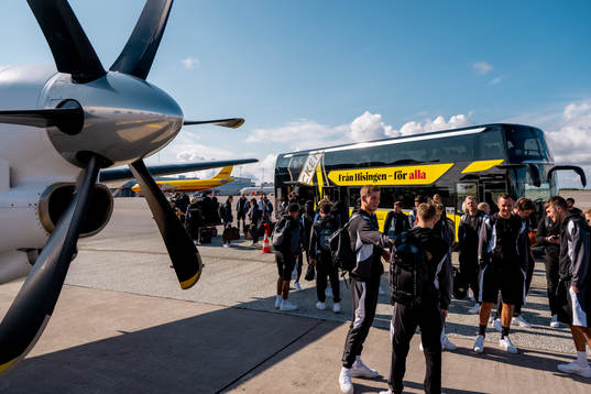 The Häcken team about to board the airplane