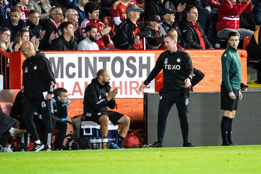 Head coach Barry Robson of Aberdeen looks dejected