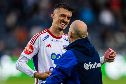 Eneo Bitri of Vålerenga and Geir Bakke, head coach of