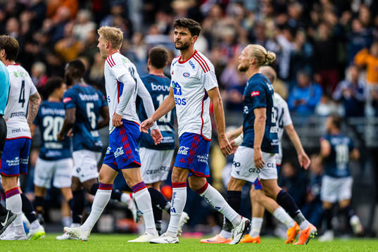 Fredrik Oldrup Jensen of Vålerenga looks dejected
