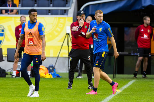 Martin Olsson and Dejan Kulusevski of Sweden
