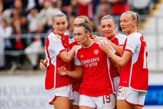 Arsenals Caitlin Foord is celebrated by her teammates