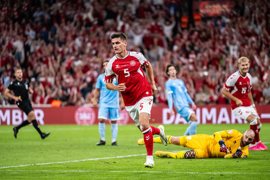 Joakim Mæhle of Denmark celebrates