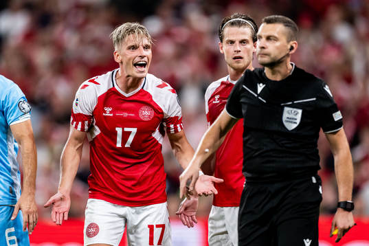 Jens Stryger of Denmark reacts