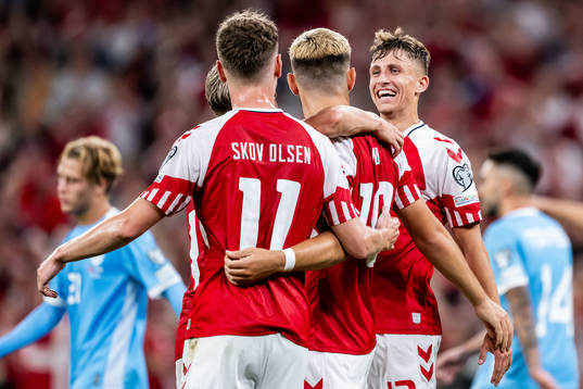 Jonas Wind of Denmark celebrates with Andreas Skov Olsen