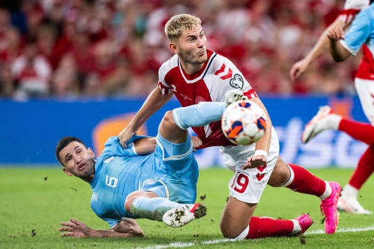 Dante Rossi of San Marino and Jonas Wind of Denmark