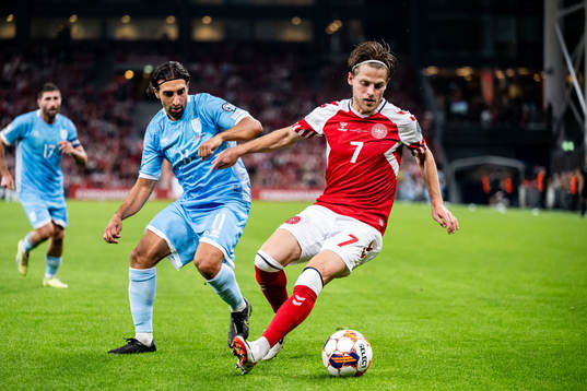 Manuel Battistini of San Marino and Mathias Jensen of