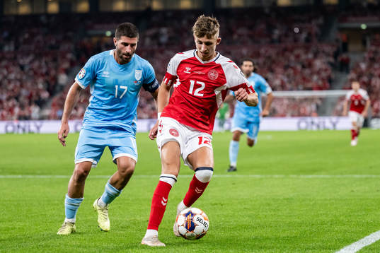 Alessandro Golinucci of San Marino and Jesper Lindstrøm of