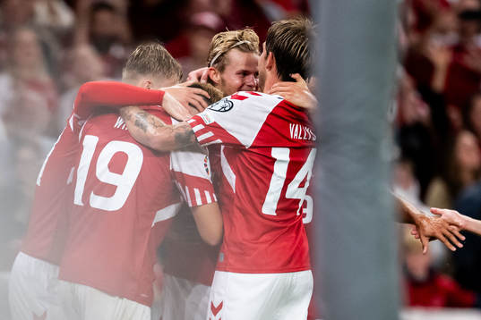 Morten Hjulmand of Denmark celebrates with team mates