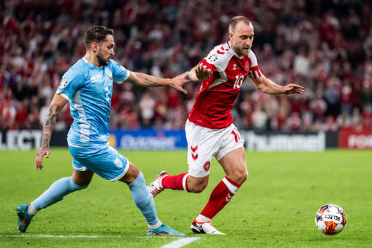 Alessandro D'Addario of San Marino and Christian Eriksen of