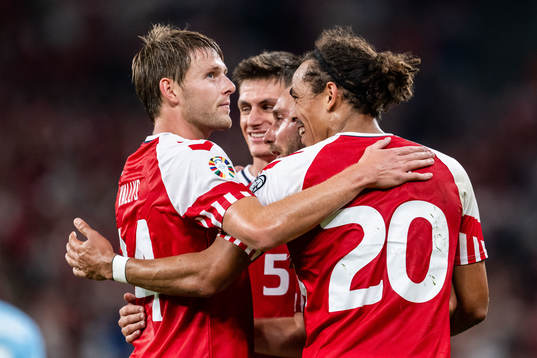 Yussuf Poulsen of Denmark celebrates with Nicolai Vallys