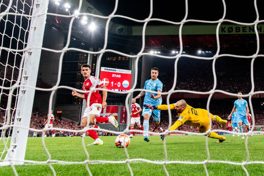 Joakim Mæhle of Denmark scores the 2-0 goal against