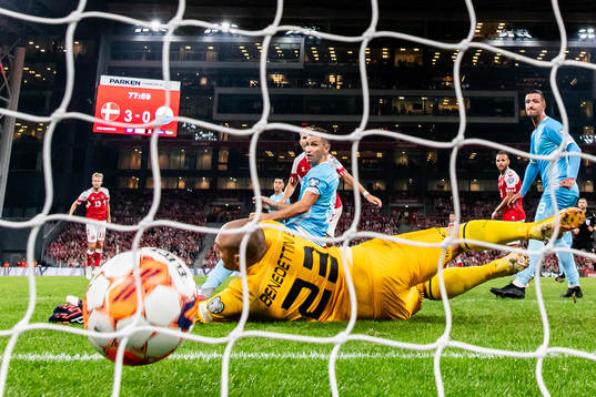 Morten Hjulmand of Denmark scores a goal against goalkeeper