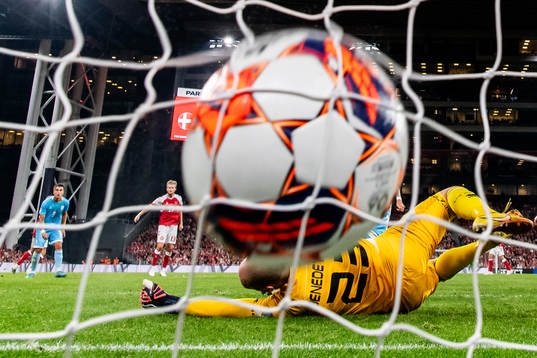 Morten Hjulmand of Denmark scores a goal against goalkeeper