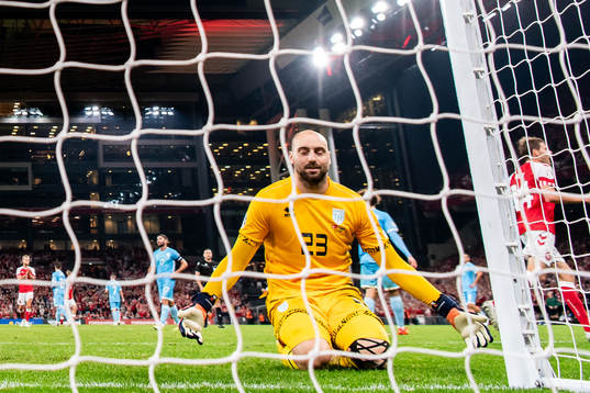 Goalkeeper Elia Benedettini of San Marino looks dejected