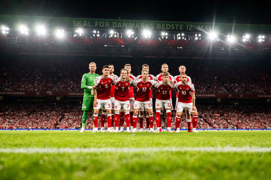 The starting eleven of Denmark pose for a team photo