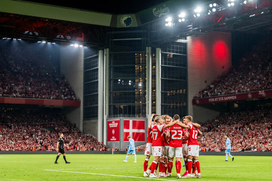 Players of Denmark celebrate