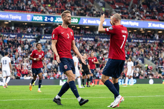 Kristoffer Ajer celebrates with Fredrik Aursnes of Norway