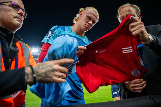 Erling Braut Haaland of Norway signs autographs