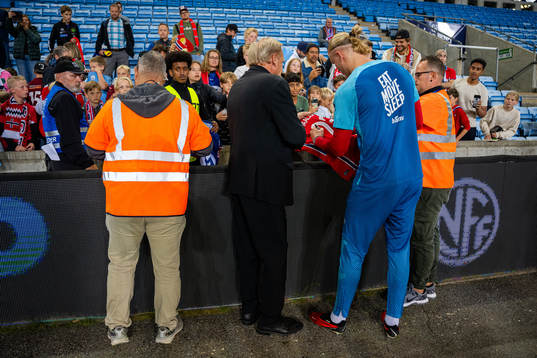 Erling Braut Haaland of Norway signs autographs