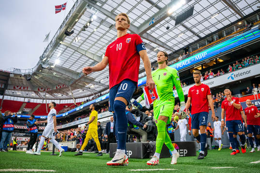 Martin Ødegaard and goalkeeper Ørjan Håskjold Nyland of