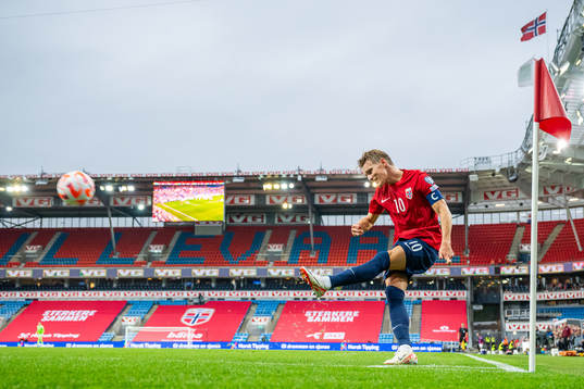Martin Ødegaard of Norway takes a corner kick
