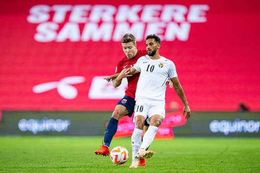 Fredrik André Bjørkan of Norway and Mousa Suleiman of
