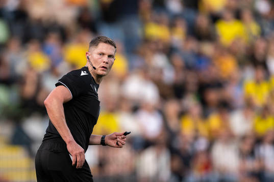 Referee David Dickinson